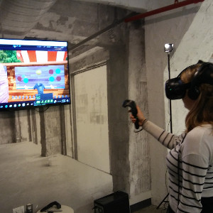 Screenshot of user playing VR Throwing Gallery